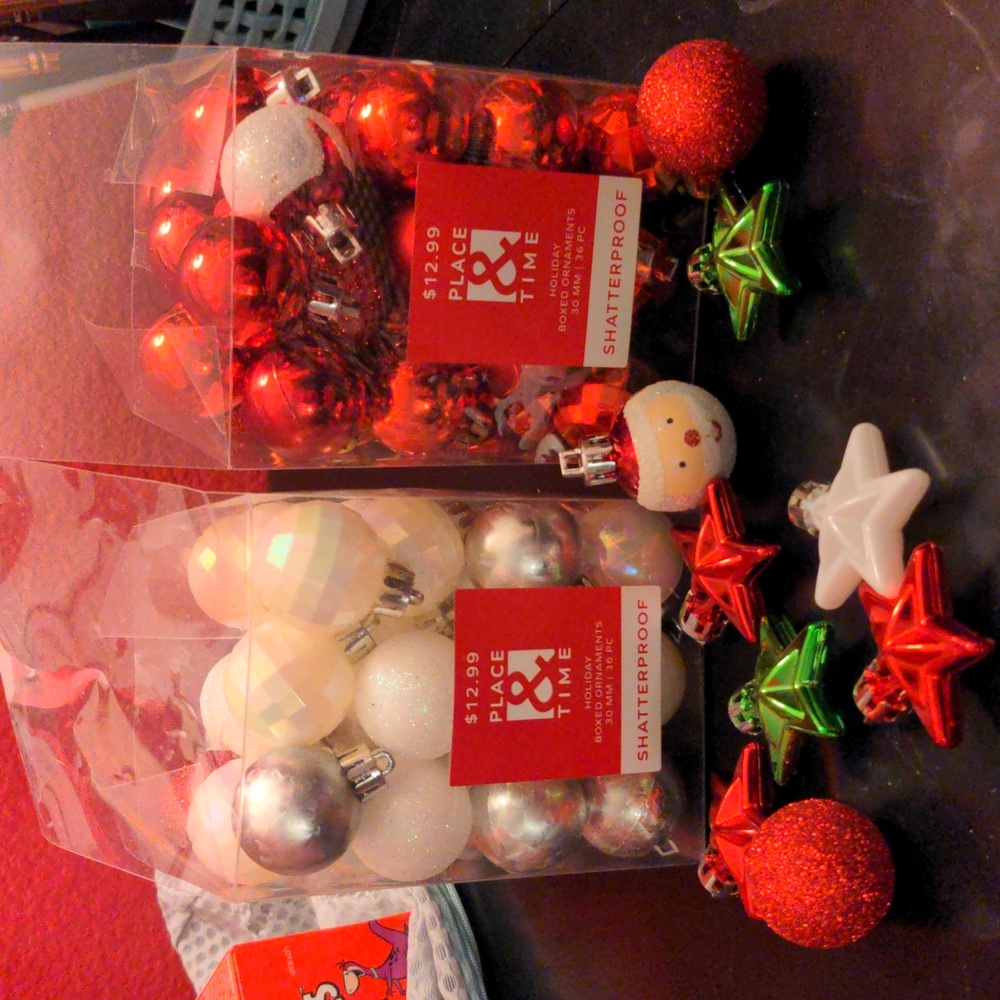 Mix of small red and white ornaments, open box but not used